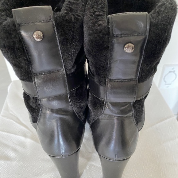 Stuart Weitzman winter boots with faux fur lining and tassel accents. - Picture 5 of 5